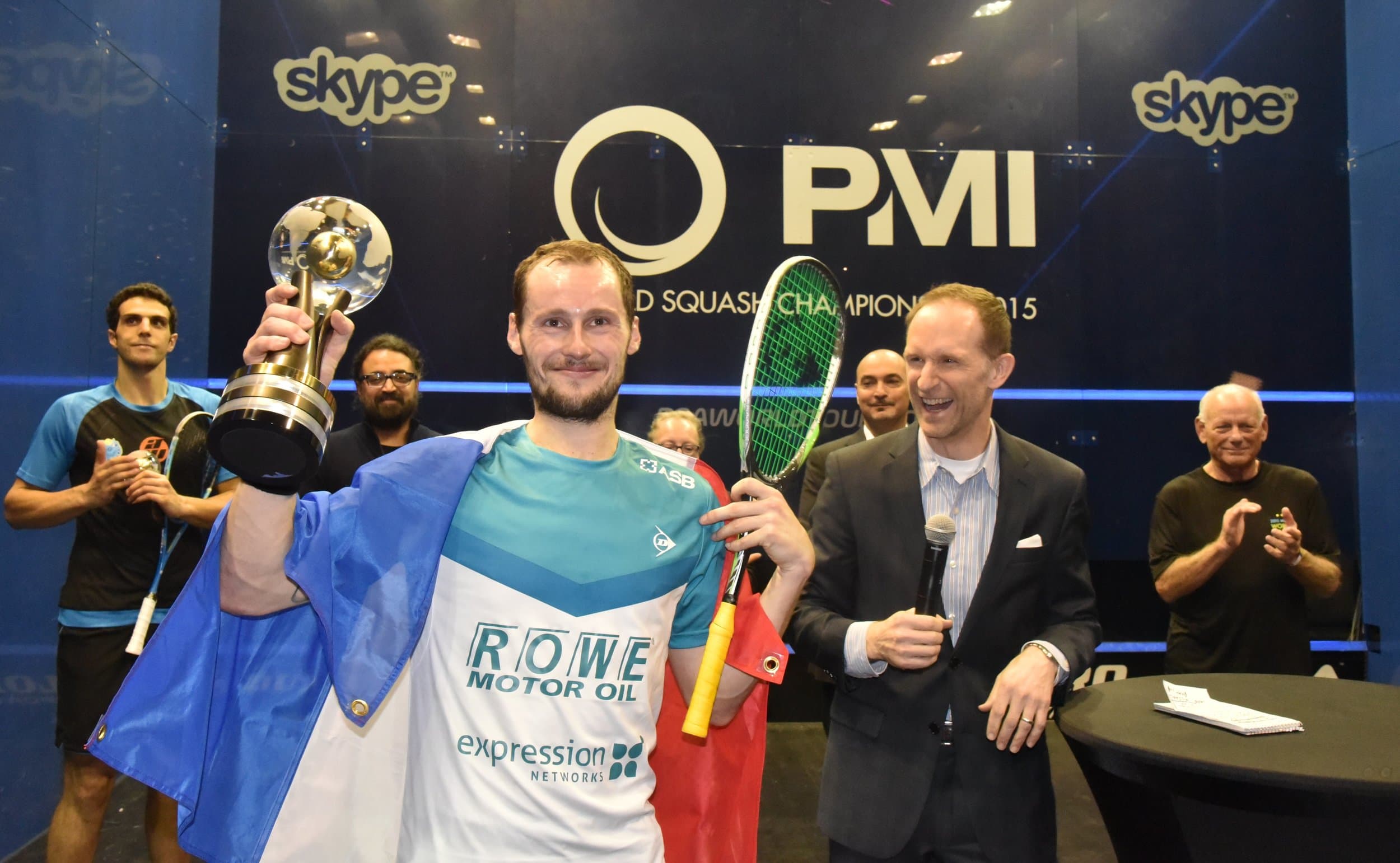 The champion lifting the trophy at the 2015 Men's World Squash Championship in Bellevue, the first ever held on U.S. soil